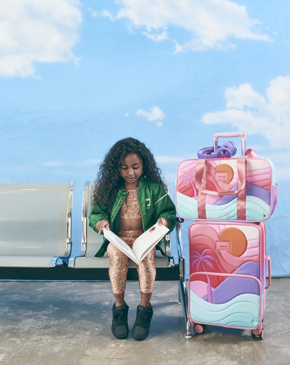 Logan Carry On Suitcase Sunset Puffer