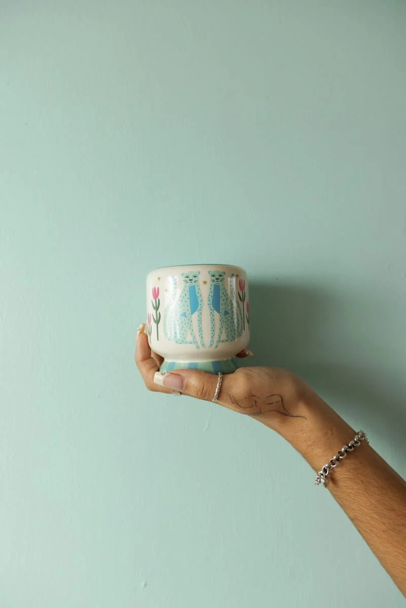 A Dopo 8 oz Hand Painted Blue Cheetah&
