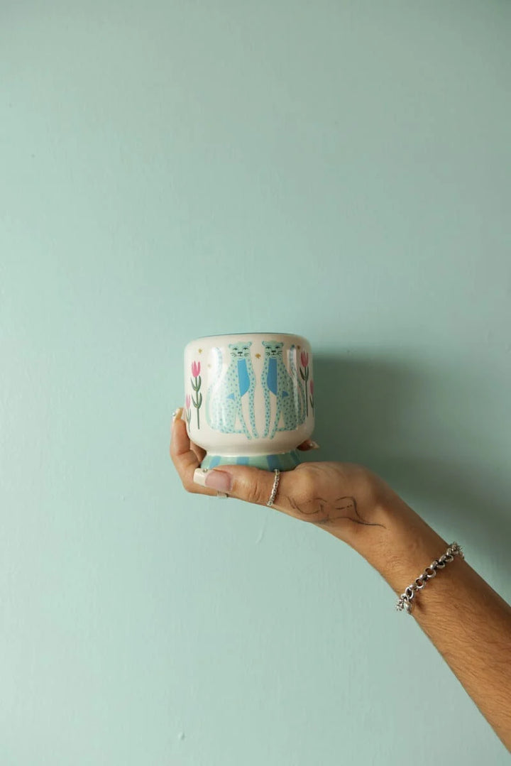 A Dopo 8 oz Hand Painted Blue Cheetah&